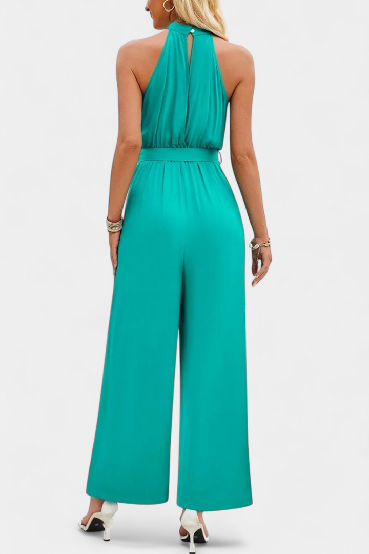 Nyree Asymmetrical Mono with Cut-Out and Bow Sleeve